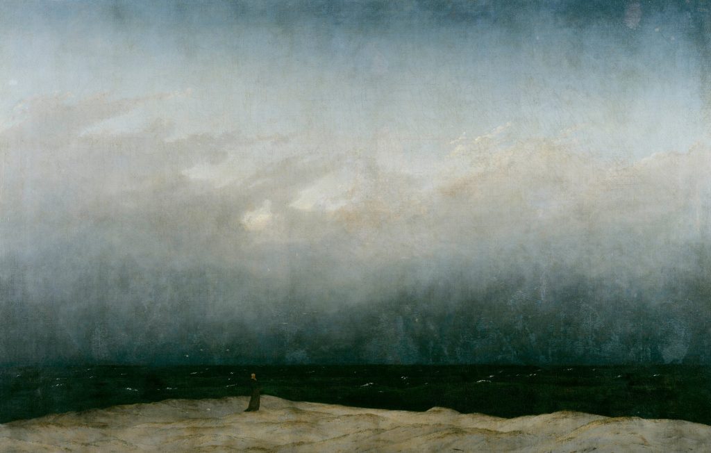 Caspar David Friedrich, Der Mönch am Meer: winzige Gestalt am Strand vor dunklem Meer und weitem Himmel